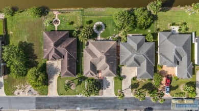 This well-maintained 3-bedroom, 2.5-bath home offers peaceful on South Padre Island Golf Club in Texas - for sale on GolfHomes.com, golf home, golf lot