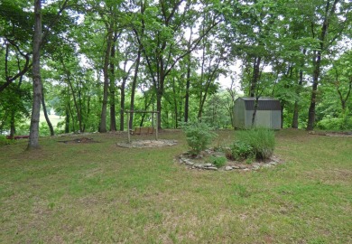 South Fork River Views! This one-level home has 2 bedrooms, 2 on Cherokee Village North Course in Arkansas - for sale on GolfHomes.com, golf home, golf lot