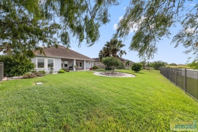 This well-maintained 3-bedroom, 2.5-bath home offers peaceful on South Padre Island Golf Club in Texas - for sale on GolfHomes.com, golf home, golf lot