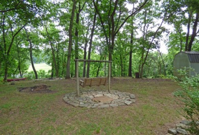 South Fork River Views! This one-level home has 2 bedrooms, 2 on Cherokee Village North Course in Arkansas - for sale on GolfHomes.com, golf home, golf lot