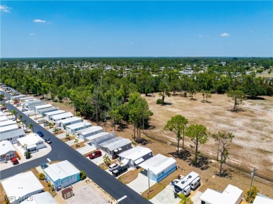 Welcome to this cozy and efficient 1-bedroom manufactured home on Del Tura Golf and Country Club in Florida - for sale on GolfHomes.com, golf home, golf lot