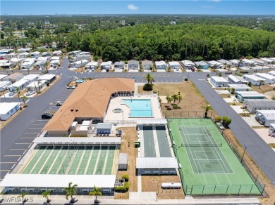 Welcome to this cozy and efficient 1-bedroom manufactured home on Del Tura Golf and Country Club in Florida - for sale on GolfHomes.com, golf home, golf lot
