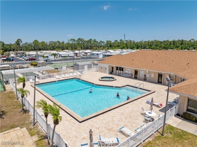 Welcome to this cozy and efficient 1-bedroom manufactured home on Del Tura Golf and Country Club in Florida - for sale on GolfHomes.com, golf home, golf lot