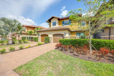 Welcome to this stunning upstairs end unit in the spectacular on Esplanade Golf and  Country Club in Florida - for sale on GolfHomes.com, golf home, golf lot