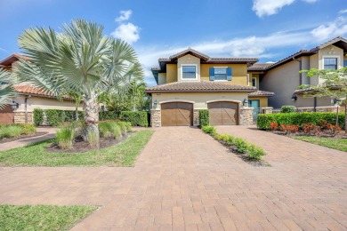 Welcome to this stunning upstairs end unit in the spectacular on Esplanade Golf and  Country Club in Florida - for sale on GolfHomes.com, golf home, golf lot