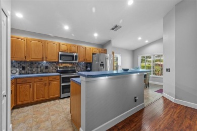 Golf course views, a private pool, and a prime location inside on TPC of Tampa Bay in Florida - for sale on GolfHomes.com, golf home, golf lot