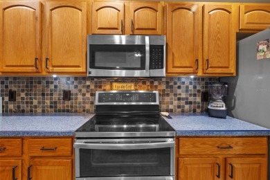 Golf course views, a private pool, and a prime location inside on TPC of Tampa Bay in Florida - for sale on GolfHomes.com, golf home, golf lot