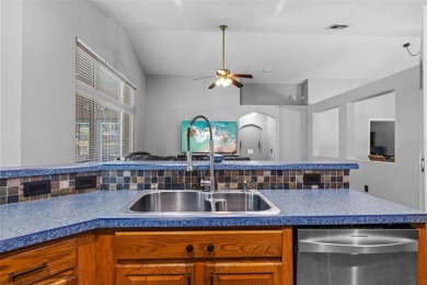 Golf course views, a private pool, and a prime location inside on TPC of Tampa Bay in Florida - for sale on GolfHomes.com, golf home, golf lot