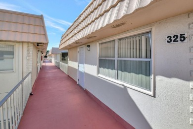 Welcome to this beautifully maintained 2nd-floor condo offering on Kings Point Golf -Flanders Way in Florida - for sale on GolfHomes.com, golf home, golf lot