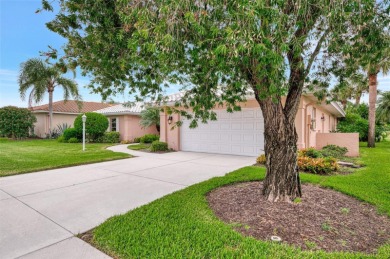 Attractive three bedroom, two bath, pool home, with golf course on Waterford Golf Club in Florida - for sale on GolfHomes.com, golf home, golf lot
