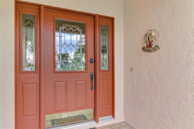 Attractive three bedroom, two bath, pool home, with golf course on Waterford Golf Club in Florida - for sale on GolfHomes.com, golf home, golf lot