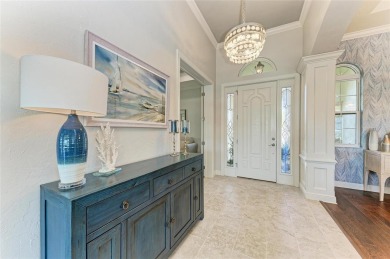 Come see this beautiful custom home in the cherished Legends Bay on IMG Academies Golf and Country Club in Florida - for sale on GolfHomes.com, golf home, golf lot