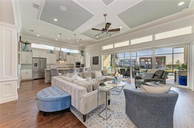 Come see this beautiful custom home in the cherished Legends Bay on IMG Academies Golf and Country Club in Florida - for sale on GolfHomes.com, golf home, golf lot