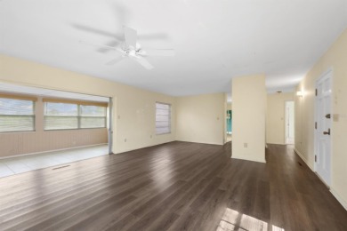 Welcome to this inviting 1963 two-bedroom, two-bathroom home on Port Charlotte Golf Club in Florida - for sale on GolfHomes.com, golf home, golf lot