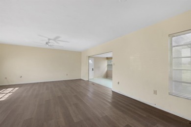 Welcome to this inviting 1963 two-bedroom, two-bathroom home on Port Charlotte Golf Club in Florida - for sale on GolfHomes.com, golf home, golf lot