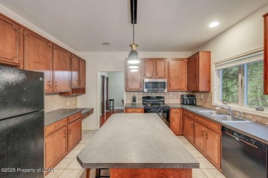 Spacious 4 bdrm. 2.5 bath home in the desirable Sand Springs on Sand Springs Country Club in Pennsylvania - for sale on GolfHomes.com, golf home, golf lot
