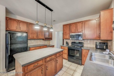 Spacious 4 bdrm. 2.5 bath home in the desirable Sand Springs on Sand Springs Country Club in Pennsylvania - for sale on GolfHomes.com, golf home, golf lot