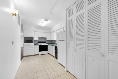 Welcome to this inviting 1963 two-bedroom, two-bathroom home on Port Charlotte Golf Club in Florida - for sale on GolfHomes.com, golf home, golf lot