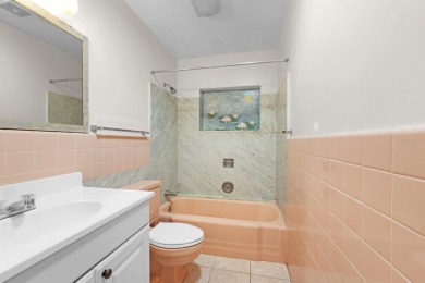 Welcome to this inviting 1963 two-bedroom, two-bathroom home on Port Charlotte Golf Club in Florida - for sale on GolfHomes.com, golf home, golf lot