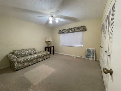 This  55+ Resort like 2 bedroom 2 bath corner unit offers on Sunrise Lakes Phase III in Florida - for sale on GolfHomes.com, golf home, golf lot