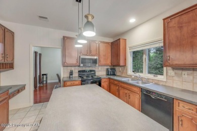Spacious 4 bdrm. 2.5 bath home in the desirable Sand Springs on Sand Springs Country Club in Pennsylvania - for sale on GolfHomes.com, golf home, golf lot