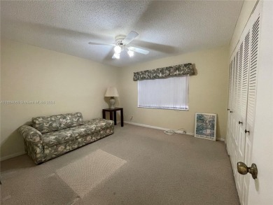 This  55+ Resort like 2 bedroom 2 bath corner unit offers on Sunrise Lakes Phase III in Florida - for sale on GolfHomes.com, golf home, golf lot