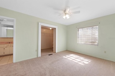 Welcome to this inviting 1963 two-bedroom, two-bathroom home on Port Charlotte Golf Club in Florida - for sale on GolfHomes.com, golf home, golf lot