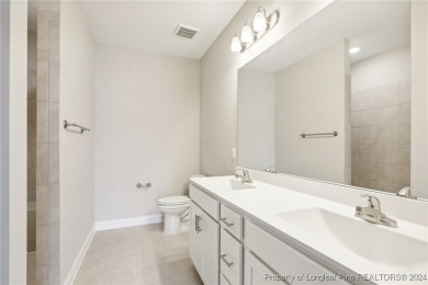 This beautiful three bedroom, two bathroom luxury condo in on Anderson Creek Golf Club in North Carolina - for sale on GolfHomes.com, golf home, golf lot