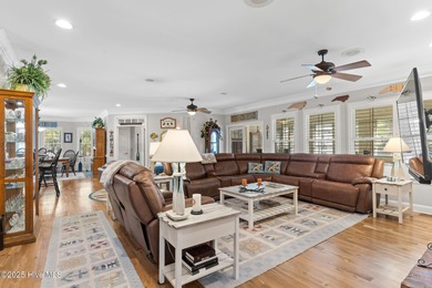 Nestled on over 1 1/2 acres in a beautiful maritime forest on Lockwood Folly Country Club in North Carolina - for sale on GolfHomes.com, golf home, golf lot