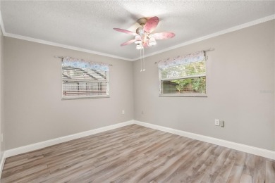 Step into a slice of paradise at 126 Duncan Trail, perfectly on Sweetwater Country Club in Florida - for sale on GolfHomes.com, golf home, golf lot