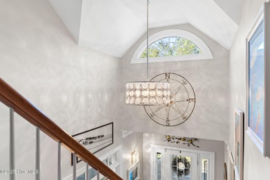 Nestled on over 1 1/2 acres in a beautiful maritime forest on Lockwood Folly Country Club in North Carolina - for sale on GolfHomes.com, golf home, golf lot