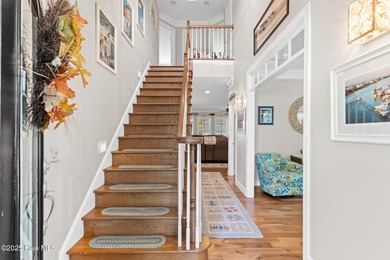 Nestled on over 1 1/2 acres in a beautiful maritime forest on Lockwood Folly Country Club in North Carolina - for sale on GolfHomes.com, golf home, golf lot