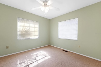 Welcome to this inviting 1963 two-bedroom, two-bathroom home on Port Charlotte Golf Club in Florida - for sale on GolfHomes.com, golf home, golf lot