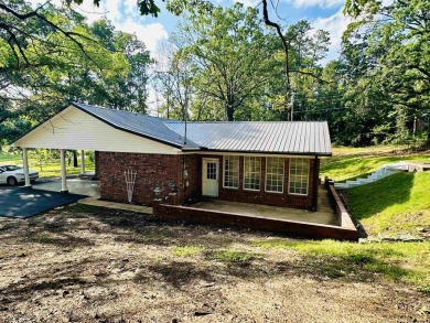 Experience luxury living in this completely remodeled 4-bedroom on Selmer Golf and Country Club in Tennessee - for sale on GolfHomes.com, golf home, golf lot