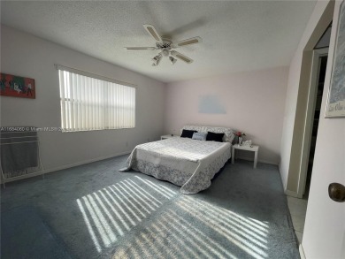 This  55+ Resort like 2 bedroom 2 bath corner unit offers on Sunrise Lakes Phase III in Florida - for sale on GolfHomes.com, golf home, golf lot