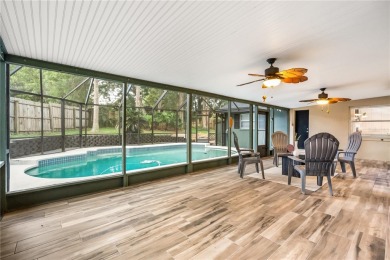Step into a slice of paradise at 126 Duncan Trail, perfectly on Sweetwater Country Club in Florida - for sale on GolfHomes.com, golf home, golf lot