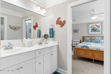 Nestled on over 1 1/2 acres in a beautiful maritime forest on Lockwood Folly Country Club in North Carolina - for sale on GolfHomes.com, golf home, golf lot