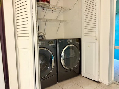 Welcome to this inviting 1963 two-bedroom, two-bathroom home on Port Charlotte Golf Club in Florida - for sale on GolfHomes.com, golf home, golf lot