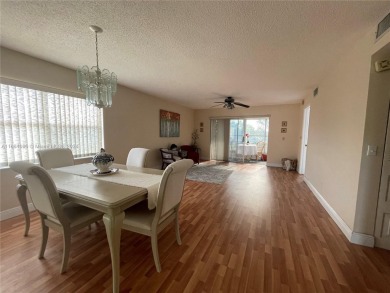 This  55+ Resort like 2 bedroom 2 bath corner unit offers on Sunrise Lakes Phase III in Florida - for sale on GolfHomes.com, golf home, golf lot