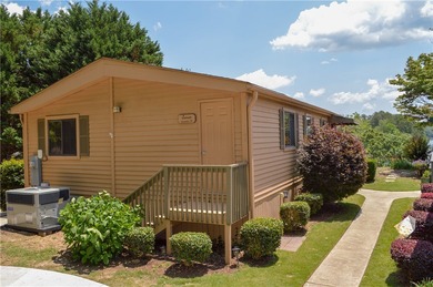 Enjoy Lake Keowee living at an affordable price! This furnished on Blue Ridge Golf Center, Inc. in South Carolina - for sale on GolfHomes.com, golf home, golf lot