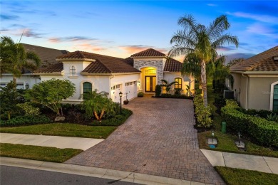 Welcome to 15520 Castle Park Terrace, a custom Neal Signature on Ritz-Carlton Members Golf Club in Florida - for sale on GolfHomes.com, golf home, golf lot