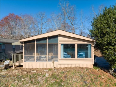 Enjoy Lake Keowee living at an affordable price! This furnished on Blue Ridge Golf Center, Inc. in South Carolina - for sale on GolfHomes.com, golf home, golf lot
