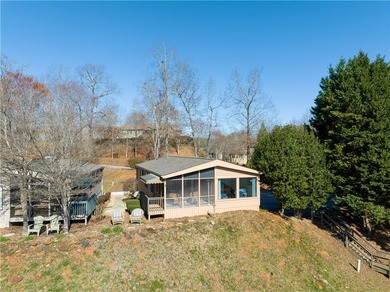 Enjoy Lake Keowee living at an affordable price! This furnished on Blue Ridge Golf Center, Inc. in South Carolina - for sale on GolfHomes.com, golf home, golf lot