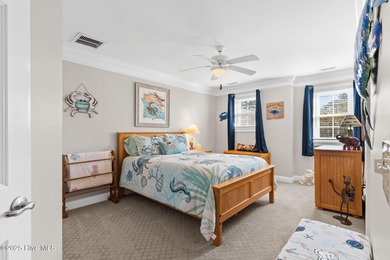 Nestled on over 1 1/2 acres in a beautiful maritime forest on Lockwood Folly Country Club in North Carolina - for sale on GolfHomes.com, golf home, golf lot