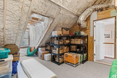 Nestled on over 1 1/2 acres in a beautiful maritime forest on Lockwood Folly Country Club in North Carolina - for sale on GolfHomes.com, golf home, golf lot