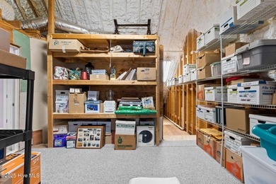 Nestled on over 1 1/2 acres in a beautiful maritime forest on Lockwood Folly Country Club in North Carolina - for sale on GolfHomes.com, golf home, golf lot