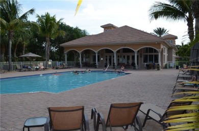 This is a beautiful second floor end unit with a green space on Pelican Sound Golf and River Club in Florida - for sale on GolfHomes.com, golf home, golf lot