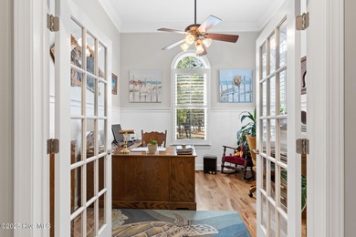 Nestled on over 1 1/2 acres in a beautiful maritime forest on Lockwood Folly Country Club in North Carolina - for sale on GolfHomes.com, golf home, golf lot