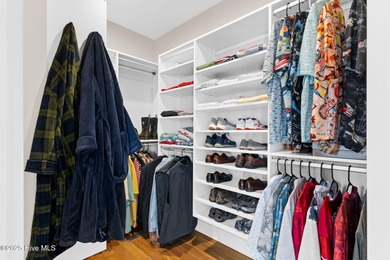 Nestled on over 1 1/2 acres in a beautiful maritime forest on Lockwood Folly Country Club in North Carolina - for sale on GolfHomes.com, golf home, golf lot