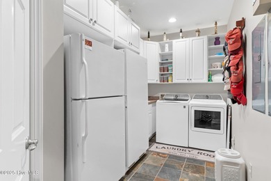 Nestled on over 1 1/2 acres in a beautiful maritime forest on Lockwood Folly Country Club in North Carolina - for sale on GolfHomes.com, golf home, golf lot